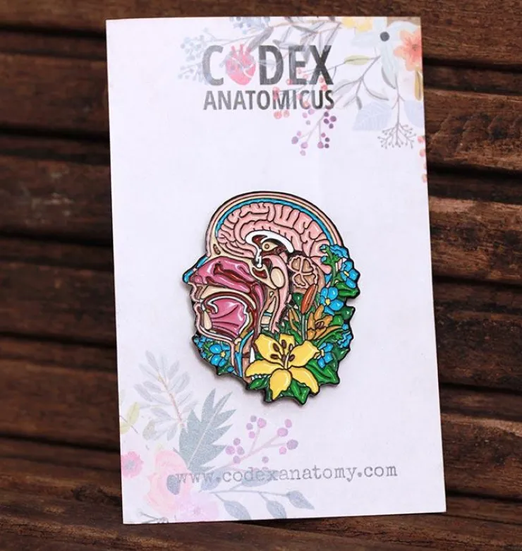 Kopfteil und Gehirn mit Blumen - Emaille Pin | Codex Anatomicus Outlet